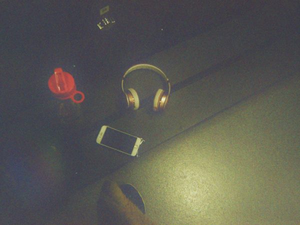 Abbi's photograph (for the 21st Century Kids) of her headphones a bottle of water and her phone.