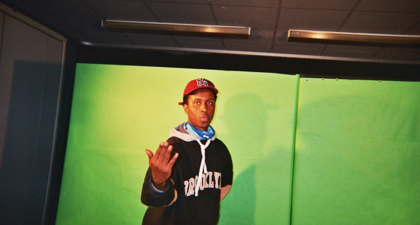 Fred's photograph (for the 21st Century Kids) of his friends, Moe, posing in front of a green screen