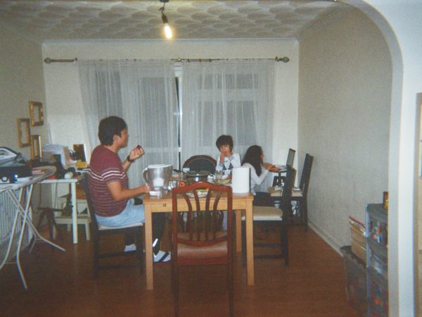 Beatriz's photograph (for the 21st Century Kids) of her family sitting down for dinner