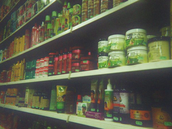 Abbi's photograph (for the 21st Century Kids) of shop shelves with hair products