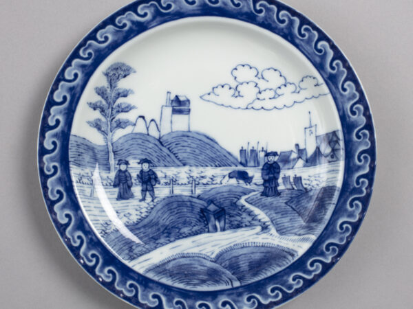 Dish with design of figures in landscape in blue decoration