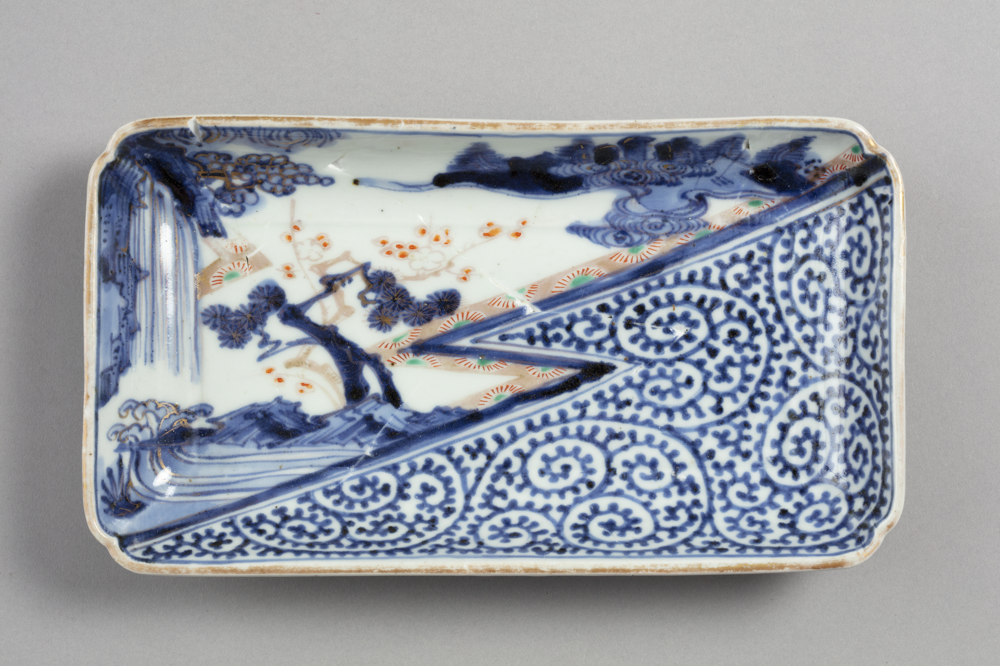 Rectangular dish with octopus scroll pattern and tree design