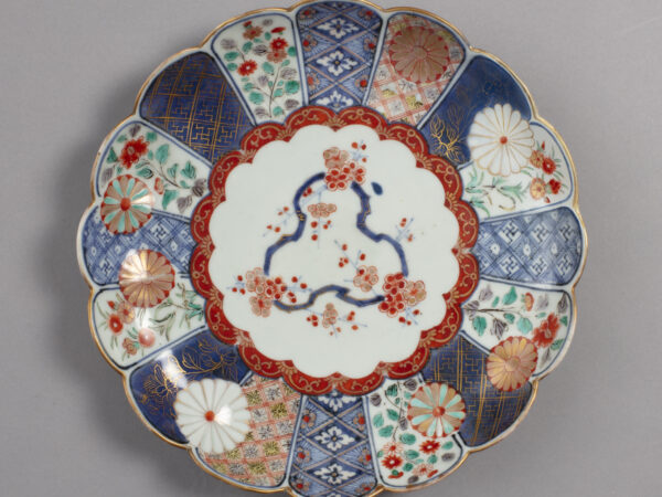 Dish with design of chrysanthemums and plum blossoms in blue, red and green