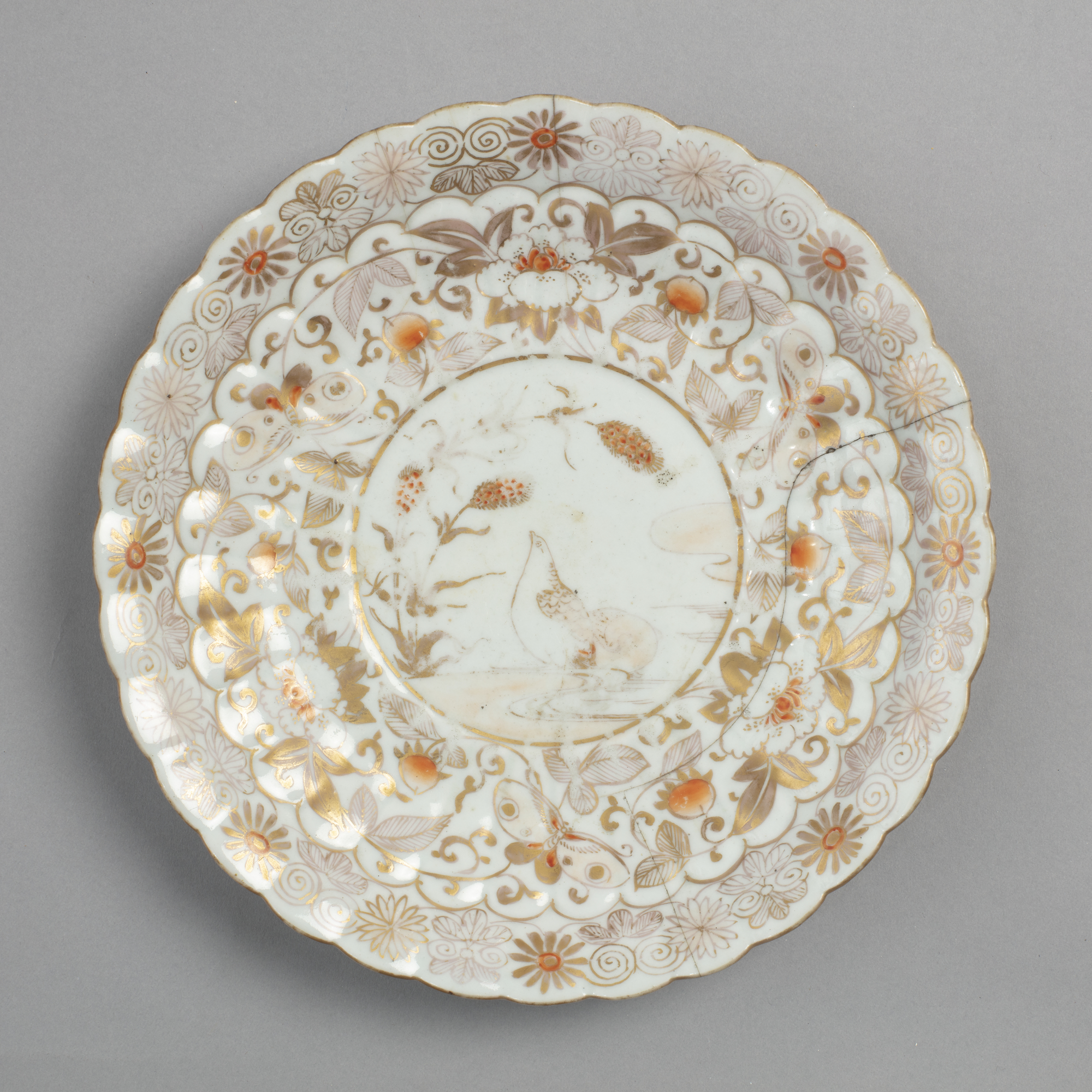 Dish with design of quails and millet in gold on white