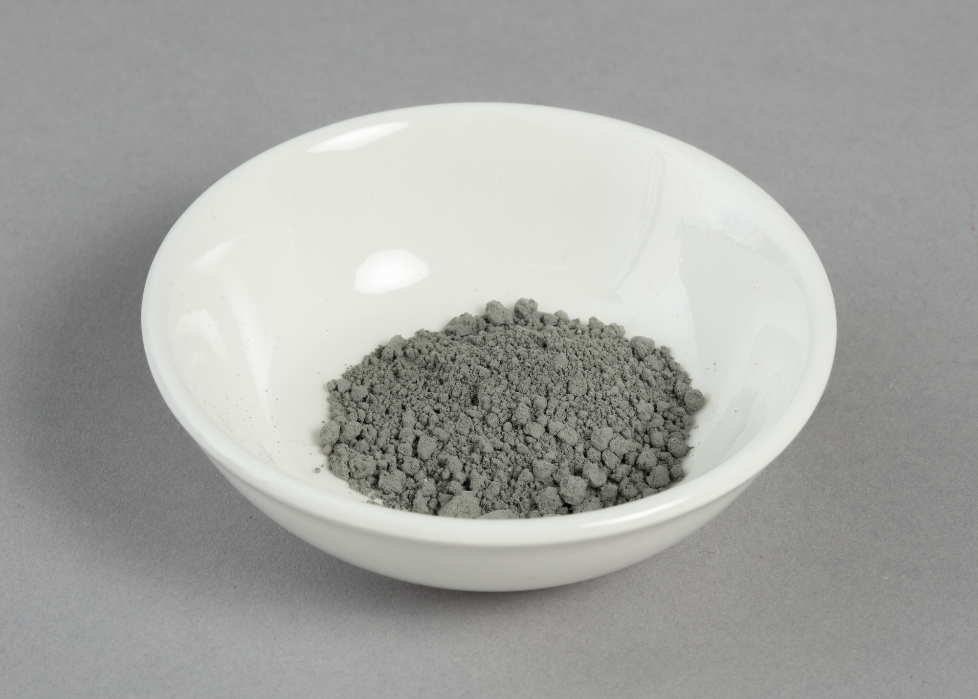 a bowl of grey-coloured cobalt oxide powder