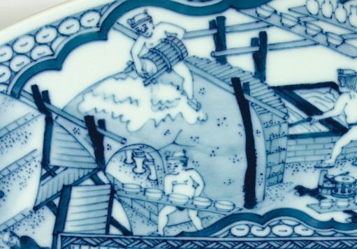 detail of a design on a dish showing biscuit firing