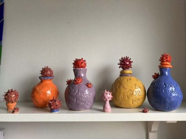 colourful handmade jars on a shelf