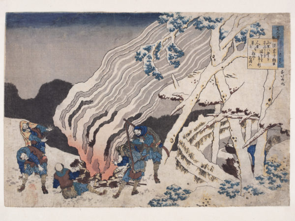 Japanese print of a group of men dressed in traditional clothes., surrounding a large camp fire, sending out flames and plumes of smoke. One man recoils hands outstretched another smiles.
