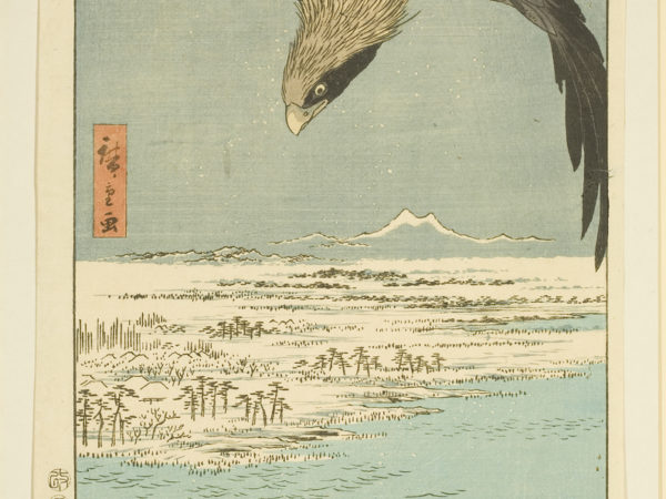 Japanese print. A large bird of prey, flies at the top of the print, wings outstretched and looking at the landscape below, of sea, land and distant mountains.