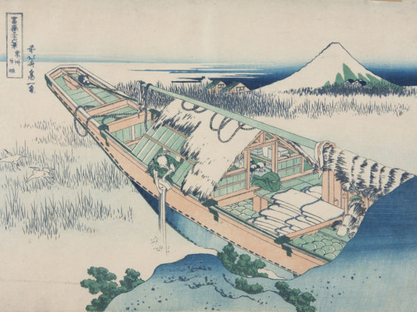 Japanese print of a barge, half of which is visible. A man is emptying a bucket of water over the side. Two storks fly off. In the background we can see a mountain and houses.