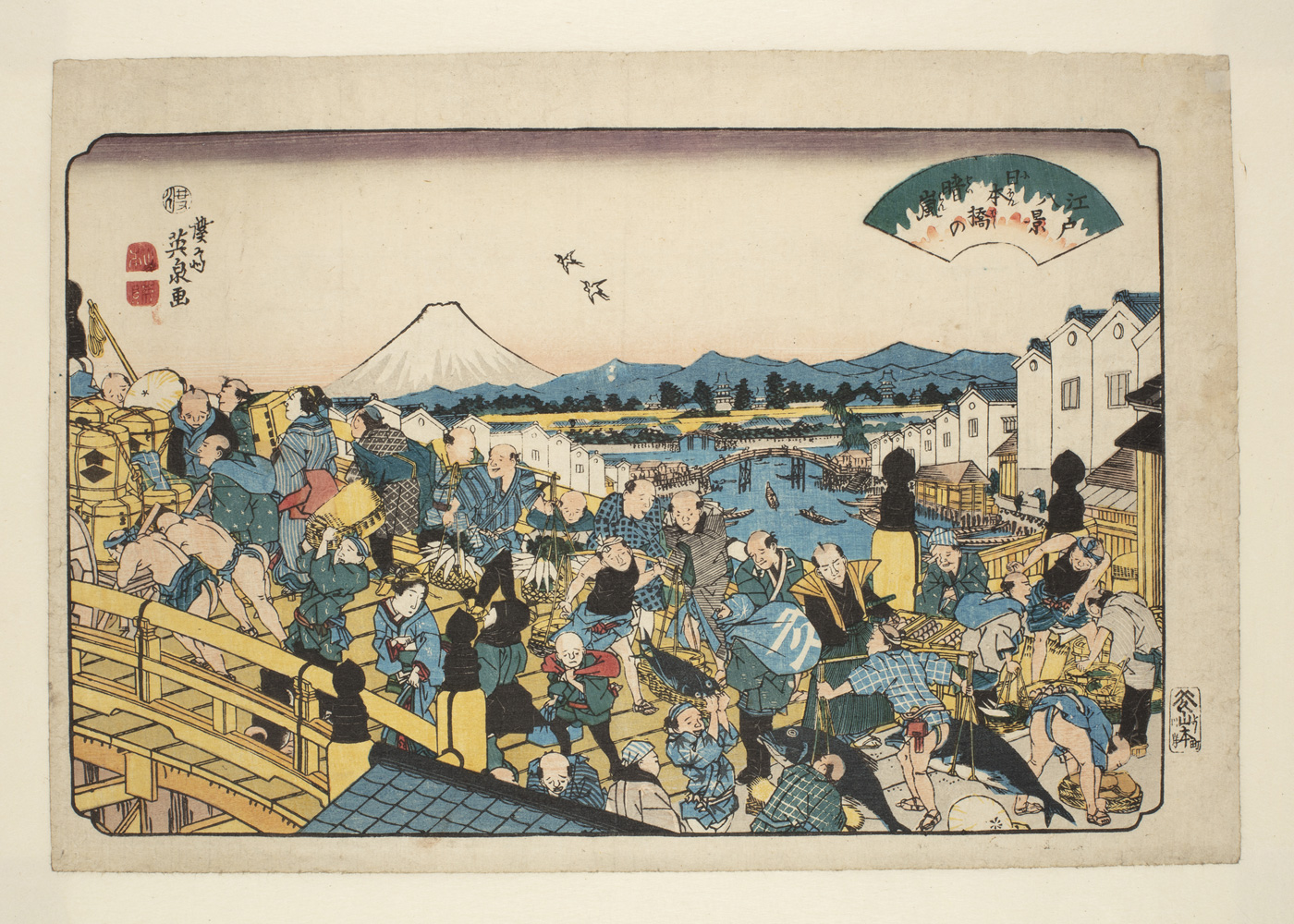 Japanese print of scene of a chaotic bridge crossing. People dressed in traditional robes, some men in loin cloths and women in kimonos. Fishermen carrying baskets of fish, others push hand carts. In the distance we see the river, buildings, mountains and Mount Fuji.