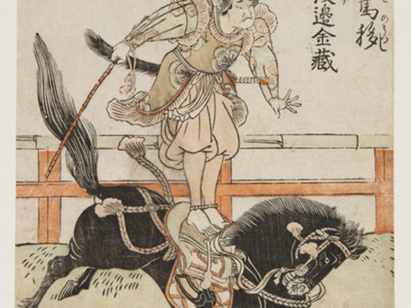 Japanese print of a horse cantering and the rider, in traditional clothes, standing and balancing on its back.