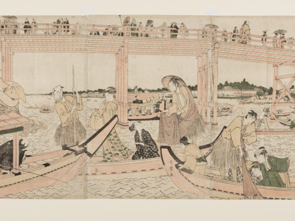 Japanese print of a busy river scene. Boats with passengers in traditional dress sail on the river, a woman climbs onto the canopy. A bridge spans the river and people walk over it.