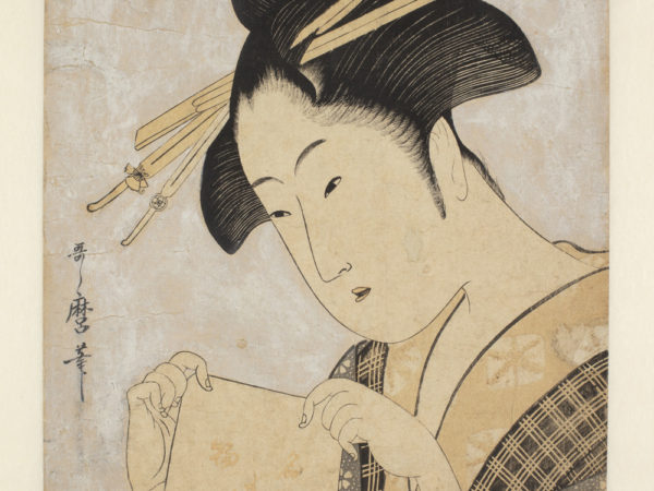 Japanese print of a woman dressed in traditional clothes holding a paper bag with Japanese text.