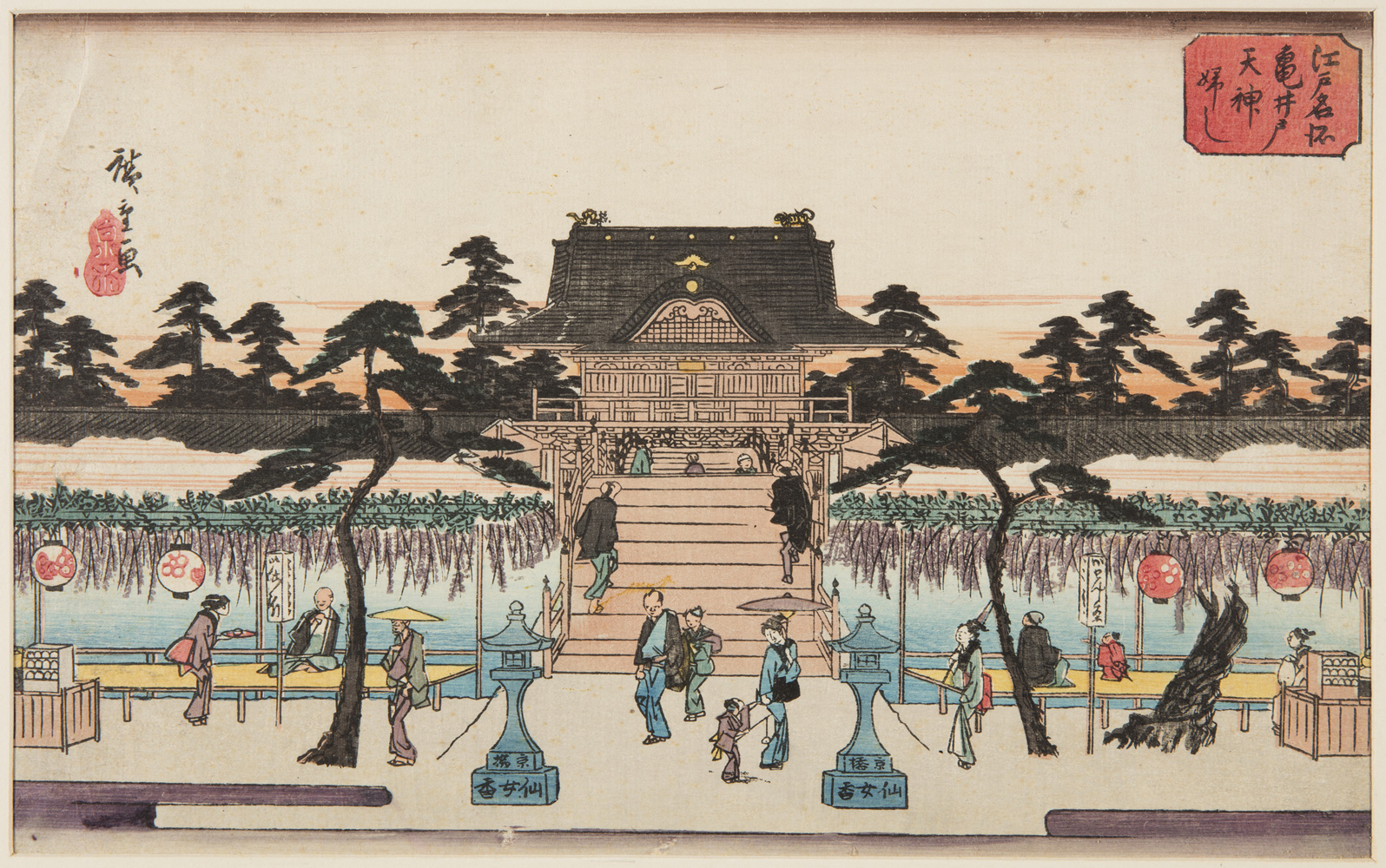 Japanese print of a garden scene. People, dressed in traditional clothes stroll or sit on platforms next to displays of hanging wisteria, steps lead up to a grand building behind.