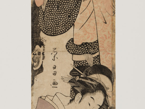 Japanese print of two women dressed in traditional clothes, one standing, one kneeling.