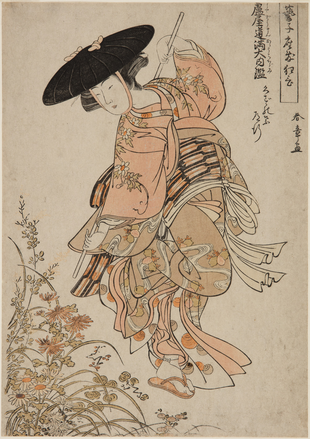 Japanese print of an actor dressed in elaborate traditional clothes standing by some flowers.